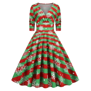 Vintage 1950s A-line Christmas dress with red and green stripes and snowflake patterns