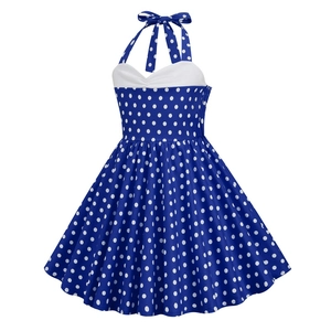 Detailed view of vintage blue polka dot dress with halter neck and sweetheart neckline
