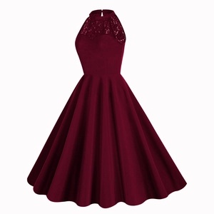 Detail of the elegant burgundy halter dress with lace bodice and shimmering sequins