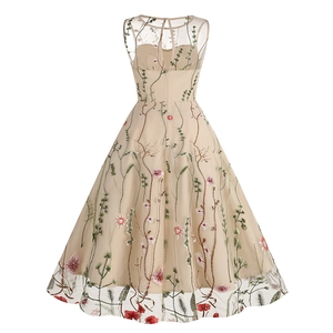 Detailed back view of vintage 50s sleeveless dress with floral embroidery and zipper