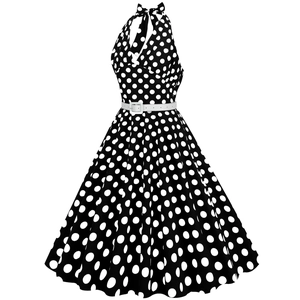 Detailed view of 1950s retro polka dot halter dress with a white waist belt and full skirt