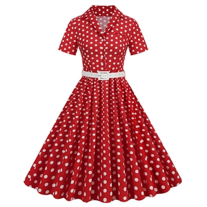 Detailed view of vintage red polka dot dress with white belt and button-up lapel collar