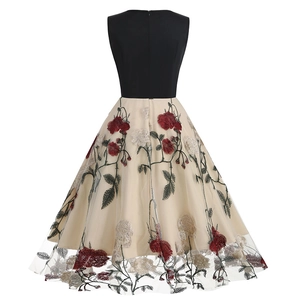 Detailed back view of vintage V-neck dress featuring mesh rose embroidery and zipper