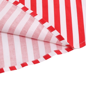 Detail view of red and white vertical stripe skirt featuring double-stitched hem finish
