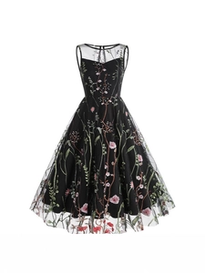 Elegant sleeveless retro A-line dress with detailed floral embroidery and mesh crew neck