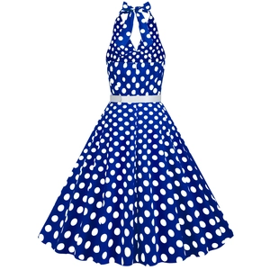 Detail of royal blue polka dot dress with halter neck tie and slim white belt