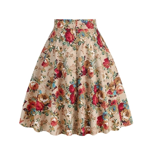 Detail of high-waisted vintage floral skirt in beige cotton fabric with A-line cut