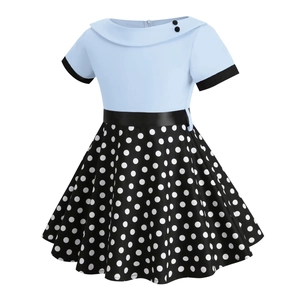 Detail of girls vintage dress with Peter Pan collar and black satin waistband