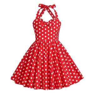 Detail view of the red polka dot halter neck dress featuring double decorative bows