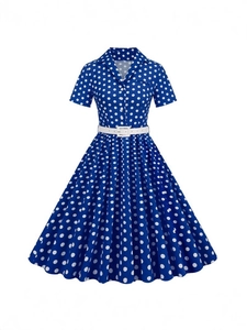 Vintage navy blue polka dot A-line dress with short sleeves and white belt buckle