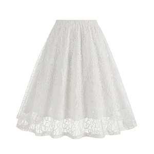 Detailed close-up of white floral lace pattern and scalloped hem on high-waist A-line skirt