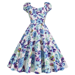 Elegant white floral A-line dress with puff sleeves and heart neckline in Hepburn style