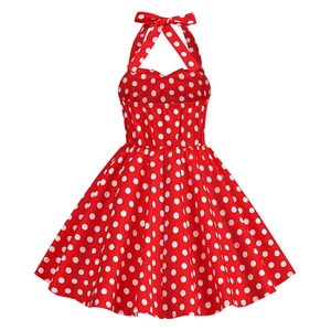 Detail of red polka dot halter neck dress with retro bow tie and vintage A-line hem