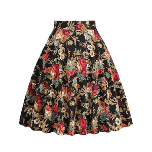 Close-up of high-waisted A-line midi skirt with vintage floral print and back zipper