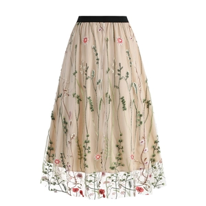Close-up of floral embroidery on high-waist double-layer mesh midi skirt with black elastic band