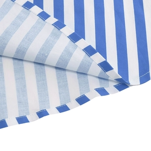 Detail of blue and white vertical striped woven fabric with neat double stitching finish