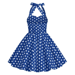 Detail of the sweetheart neckline and white polka dots on this navy retro dress