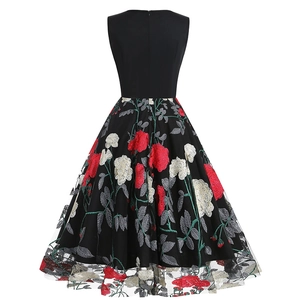 Vintage sleeveless V-neck dress with black bodice and embroidered floral mesh skirt