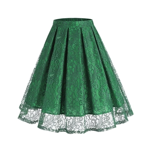 Detail showing vintage green lace pleated skirt with floral patterns and elastic waistband