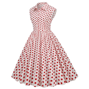 Detail of 50s vintage polka dot dress featuring a lapel collar and button-down front