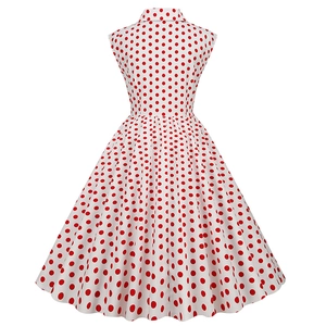 Detail of 1950s vintage sleeveless polka dot cocktail dress with retro A-line skirt