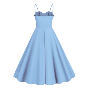 Detail view of the hidden back zipper on a 50s vintage light blue polka dot dress