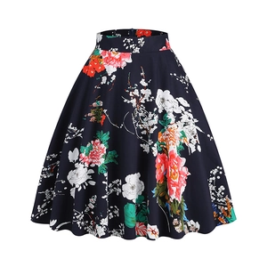 Vintage high waist A-line midi skirt with floral print on navy blue fabric