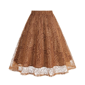 Detailed close-up of brown paisley lace crochet midi skirt with hollow-out pattern