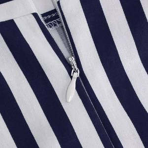 Close-up detail of invisible white zipper on blue and white striped knit fabric