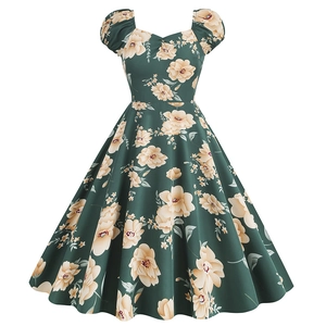 Vintage dark green floral dress with heart neck and puff sleeves in retro 1950s style
