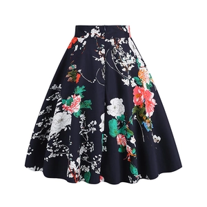 Detailed close-up of retro floral A-line skirt fabric with vibrant botanical print