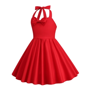 Detail of red girls halter dress featuring a large bow and elegant pleated skirt texture