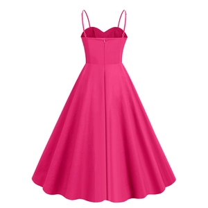 Detail of fuchsia 50s vintage polka dot dress featuring thin straps and back zipper