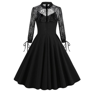 Detailed back view of a black lace A-line dress featuring elegant hollow out back design