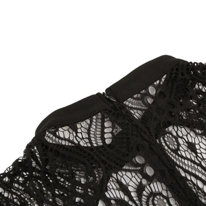 Close-up of black lace dress showing intricate floral patterns and back hidden zipper