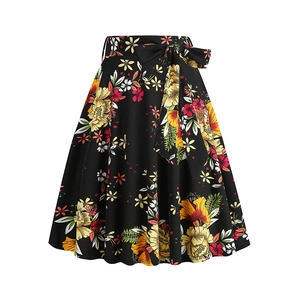 Detail of high-waist A-line skirt featuring vibrant floral patterns and bow-knot belt