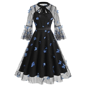 Gothic black mesh dress featuring blue butterfly appliques and a bow tie high neck
