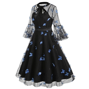 Detail of 3D blue butterfly appliques on vintage black mesh gothic dress with bow tie