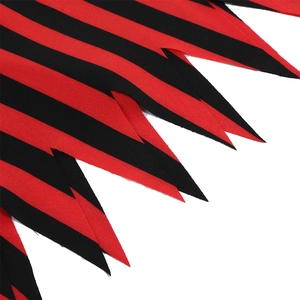 Close-up of red and black striped fabric with rugged zigzag edges for a pirate skirt