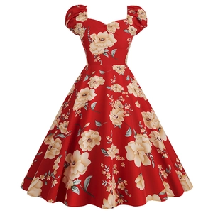 Vintage 1950s Audrey Hepburn style floral print dress in red with elegant puff sleeves