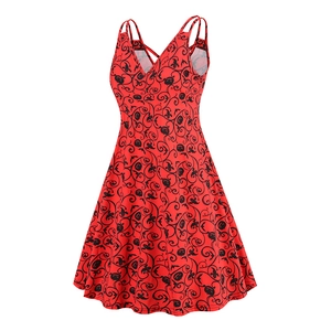 Close-up of V-neck sleeveless dress with Halloween pumpkin and bat prints in red