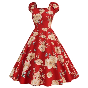 Detail of red vintage floral dress with square neck and Audrey Hepburn style flare