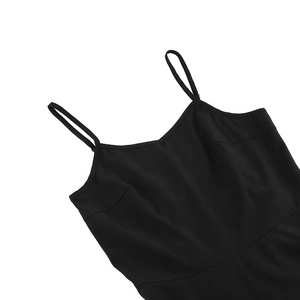 Detail shot of black gothic dress with thin shoulder straps and a V-neckline