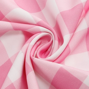 Pink and white plaid halter dress with elegant twill textured fabric for a vintage look