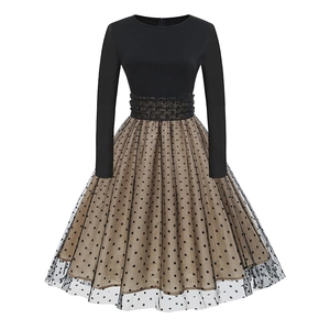 Close-up of black mesh polka dot layering and pleated waist detail on a princess dress