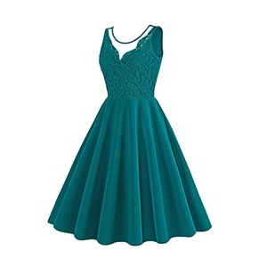 Close-up of intricate floral lace embroidery and V-neckline on a dark teal vintage dress