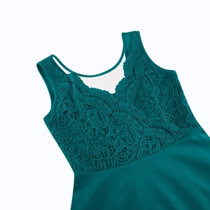 Detailed close-up of dark green sleeveless dress with intricate lace floral embroidery