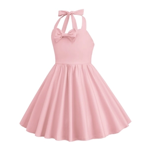 Detailed view of girls pink halter dress featuring a front bow and pleated waist design