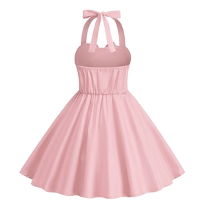 Detail view of pink vintage halter dress showing bow tie and elastic back smocking