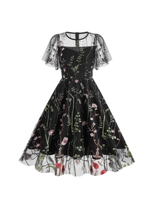 Elegant vintage black mesh cocktail dress with vibrant floral embroidery and bell sleeves
